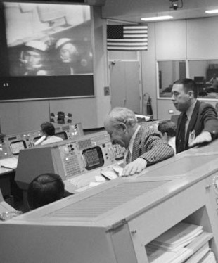 George Abbey, right, then technical assistant to the JSC director, at Mission Control during a test before the U.S.-U.S.S.R. Apollo-Soyuz mission to dock in Earth orbit. The photo was taken in March, 1975, four months before the successful mission.